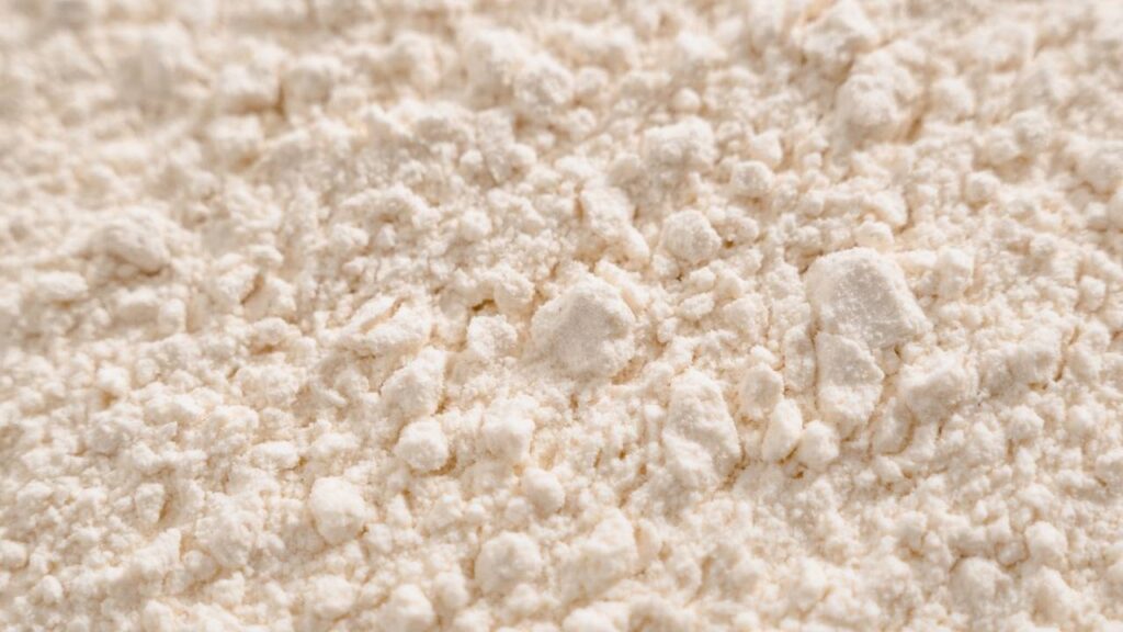 a close-up of Integrow Health's inositol powder, white powdery substance